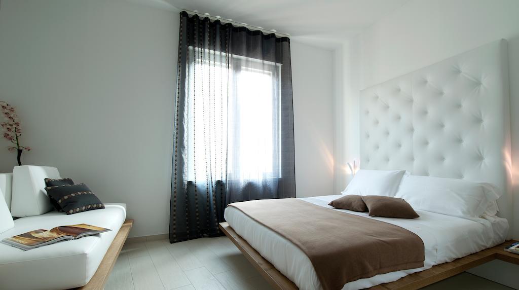 Aparthotel Duomo Milánó Szoba fotó